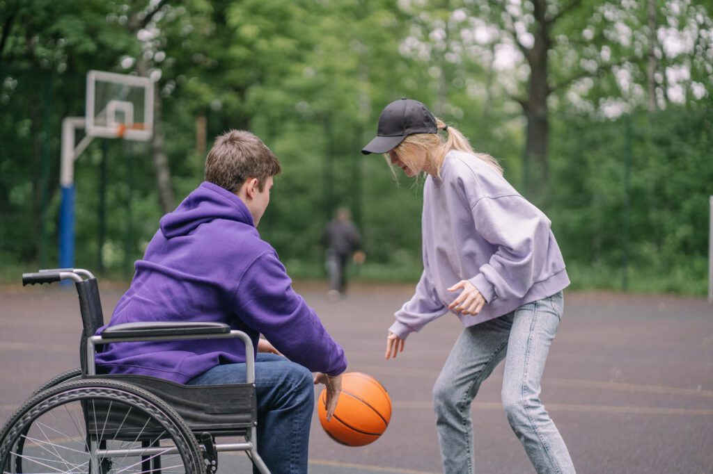 a man and woman playing basketball 8415899